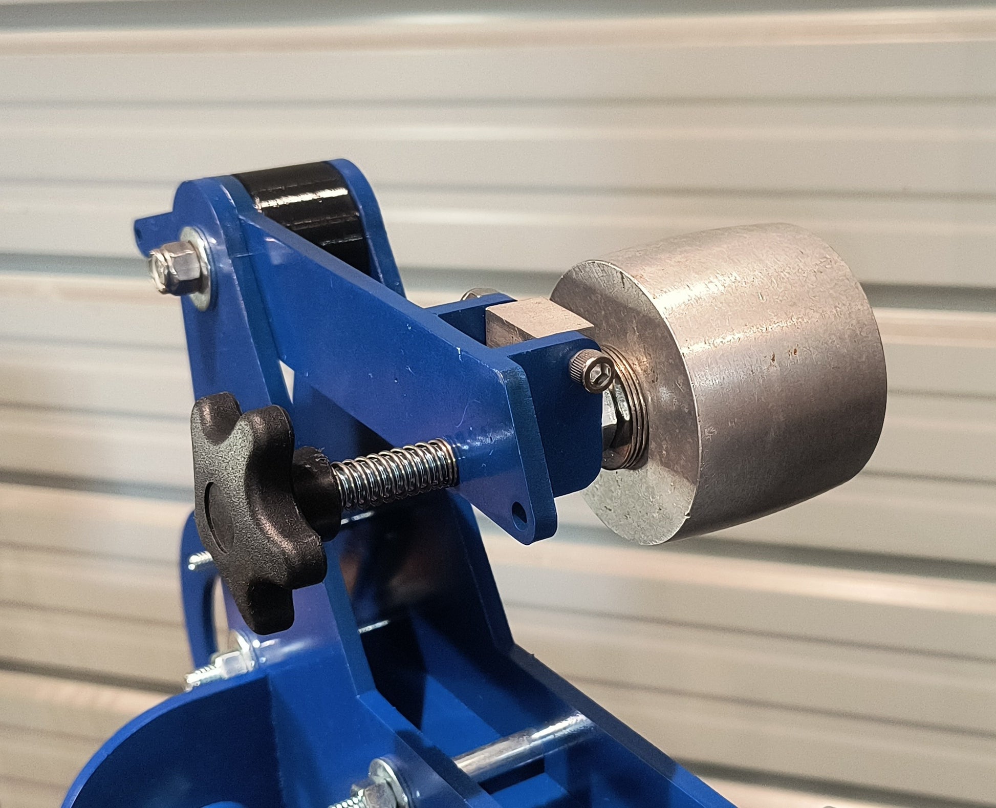 Tension arm and wheel