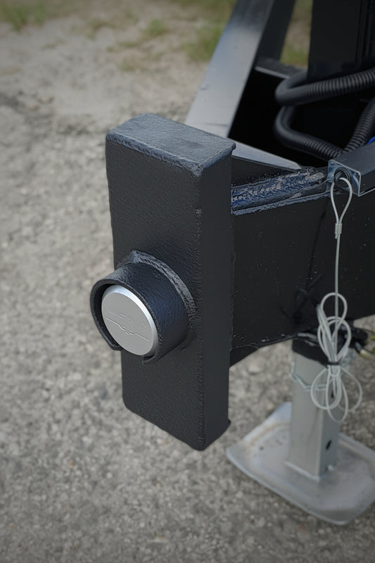 side view of black lock box with puck lock